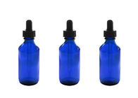 香水化学化学薬品を貯える青い空の精油のびん