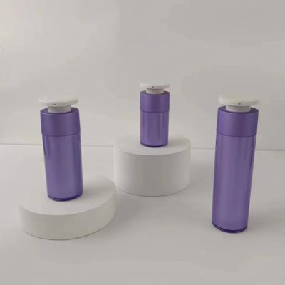 白いプッシュダウンプレスポンプの紫色プラスチック化粧品配給器ボトル