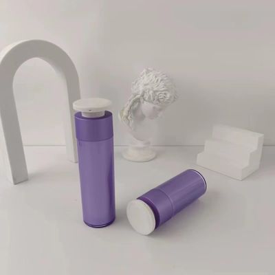 白いプッシュダウンプレスポンプの紫色プラスチック化粧品配給器ボトル